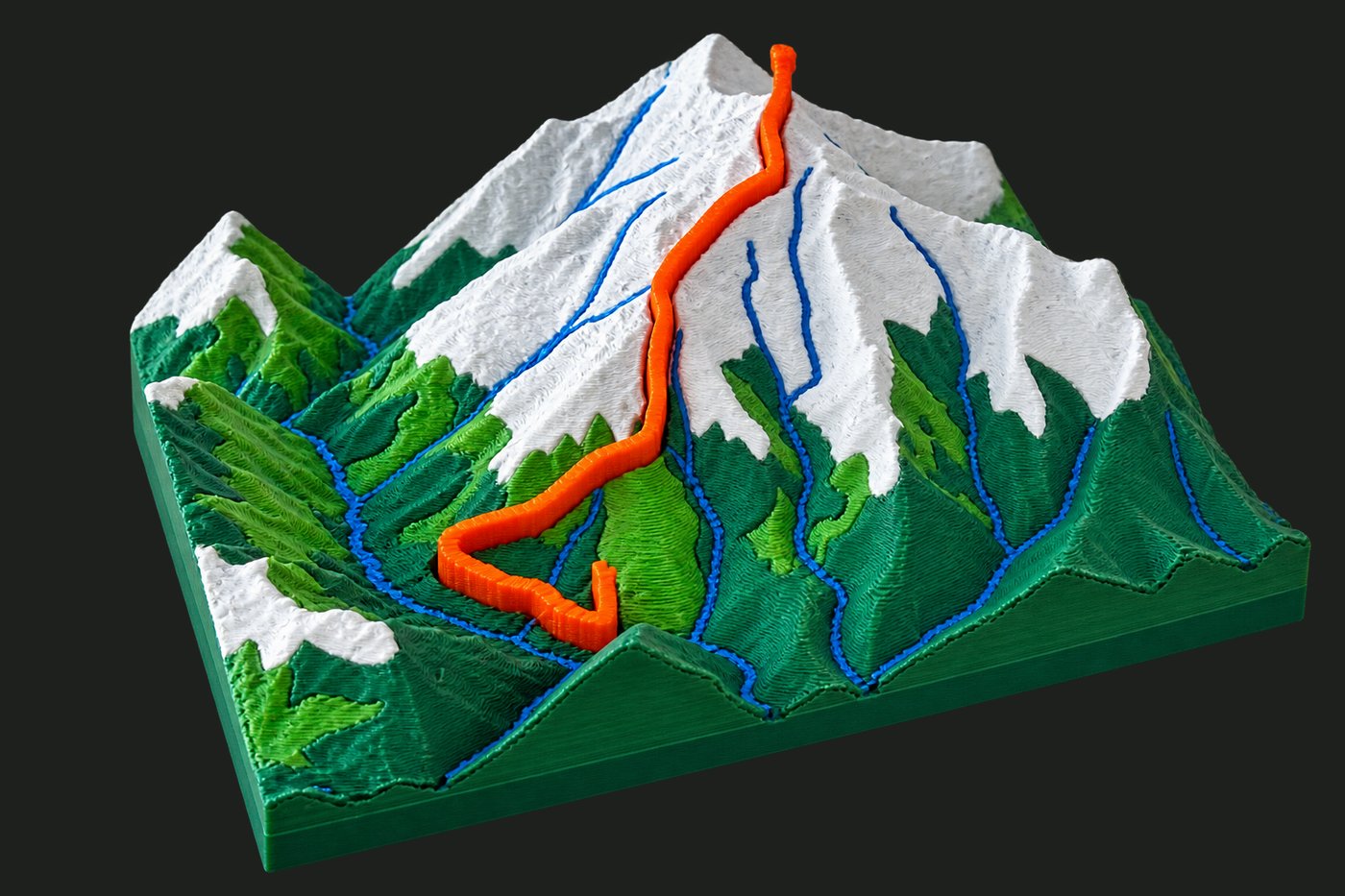 3D printed relief model of the Kedarkantha trek, with the route inlaid in orange